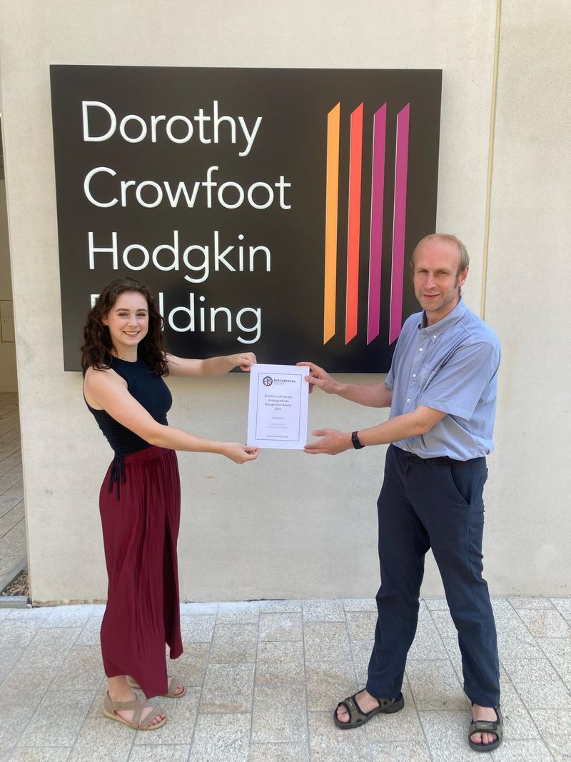 Mark Roberts presents Anna with her Biochemical Society Undergraduate Recognition Award. Mark Roberts presents Anna with her Biochemical Society Undergraduate Recognition Award.