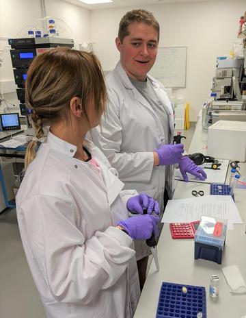 Aygul Malone training Daniel Molland, a Biochemistry DPhil student 